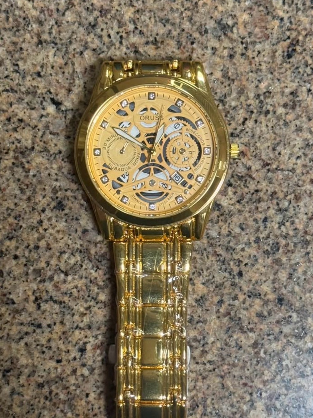 Russ Gold-Tone Men's Skeleton Bracelet Watch